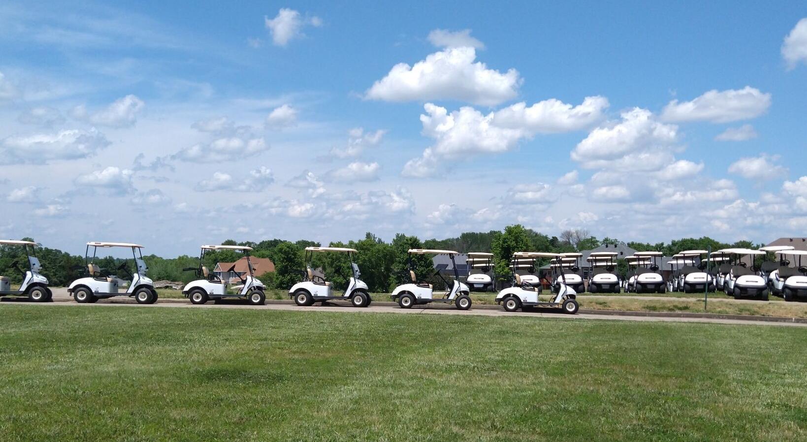 Golf carts lined up at Eagle Knoll Golf Course